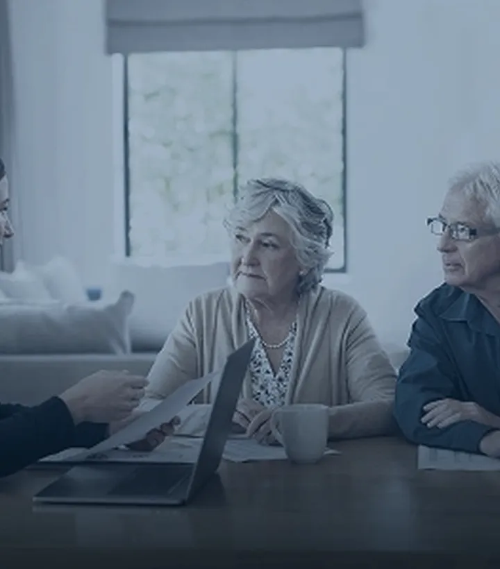Attorney advising a couple at a table